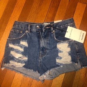 Cute ripped jean shorts! Never worn with tags💗